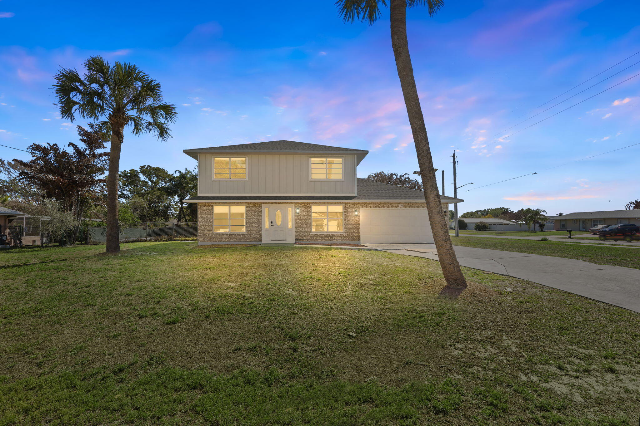 405 Northeast Midvale Street Port St. Lucie, FL 34983 - Photo 6 of 60 Sun Down Curb Shot