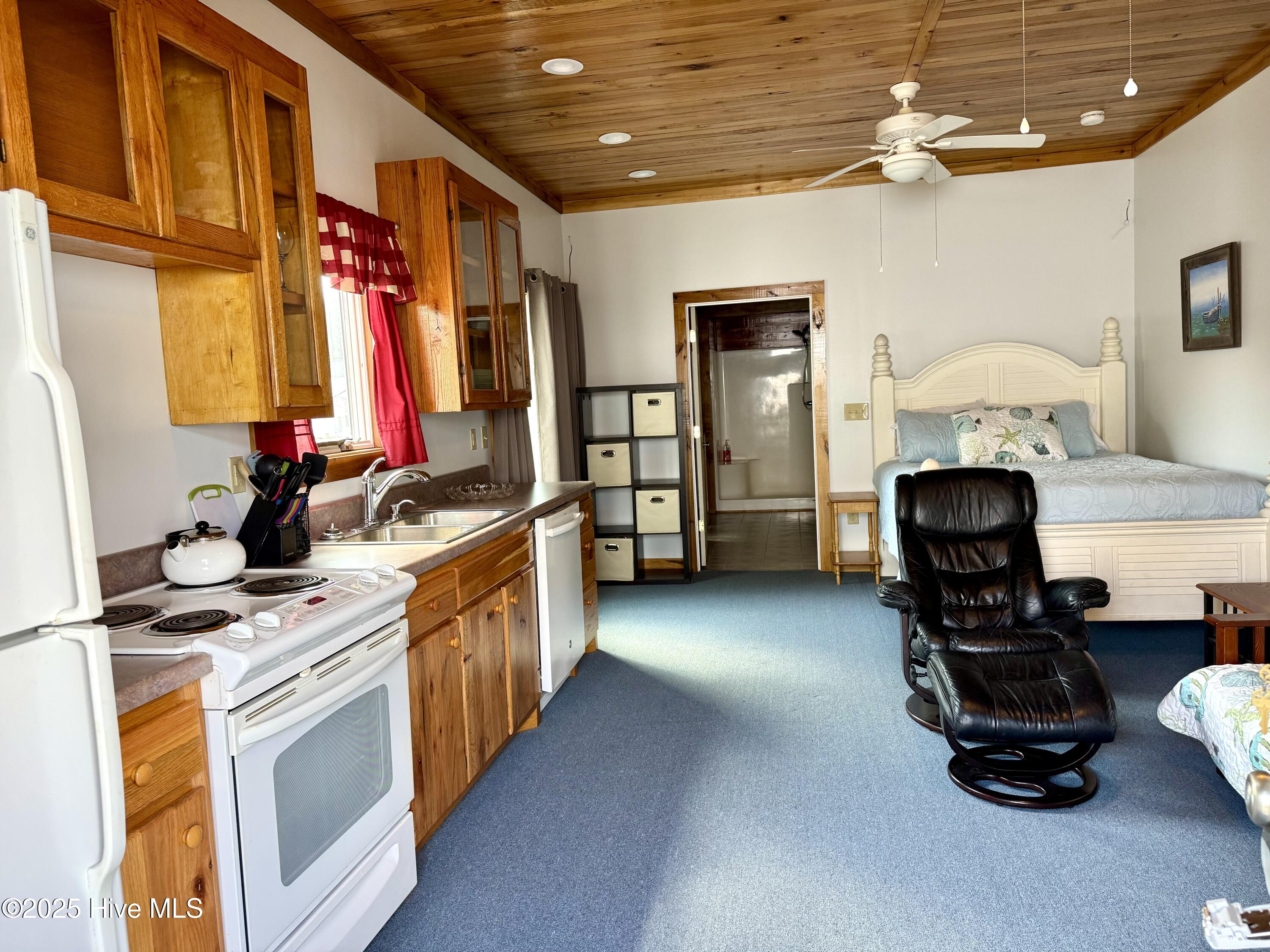 126 Northeast 75th Street, Unit BACK Oak Island, NC 28465 - Photo 2 of 10 IMG_1378