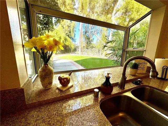 a picture of table and chair with wooden floor