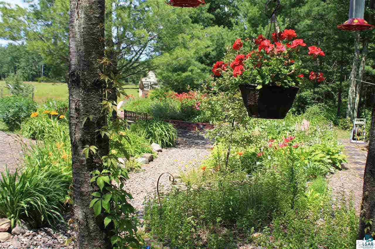 1340 West Colby Road Brule, WI 54820 - Photo 25 of 25 Beautiful Landscaping