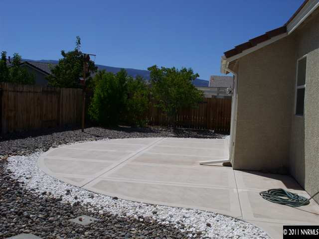 1765 Canyonlands Way Reno, NV 89521 - Photo 3 of 12 a backyard of a house