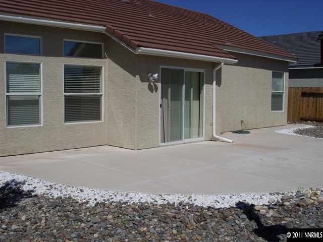 1765 Canyonlands Way Reno, NV 89521 - Photo 4 of 12 a front view of a house