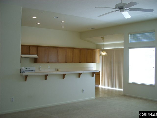 1765 Canyonlands Way Reno, NV 89521 - Photo 7 of 12 a kitchen with a sink cabinets and window
