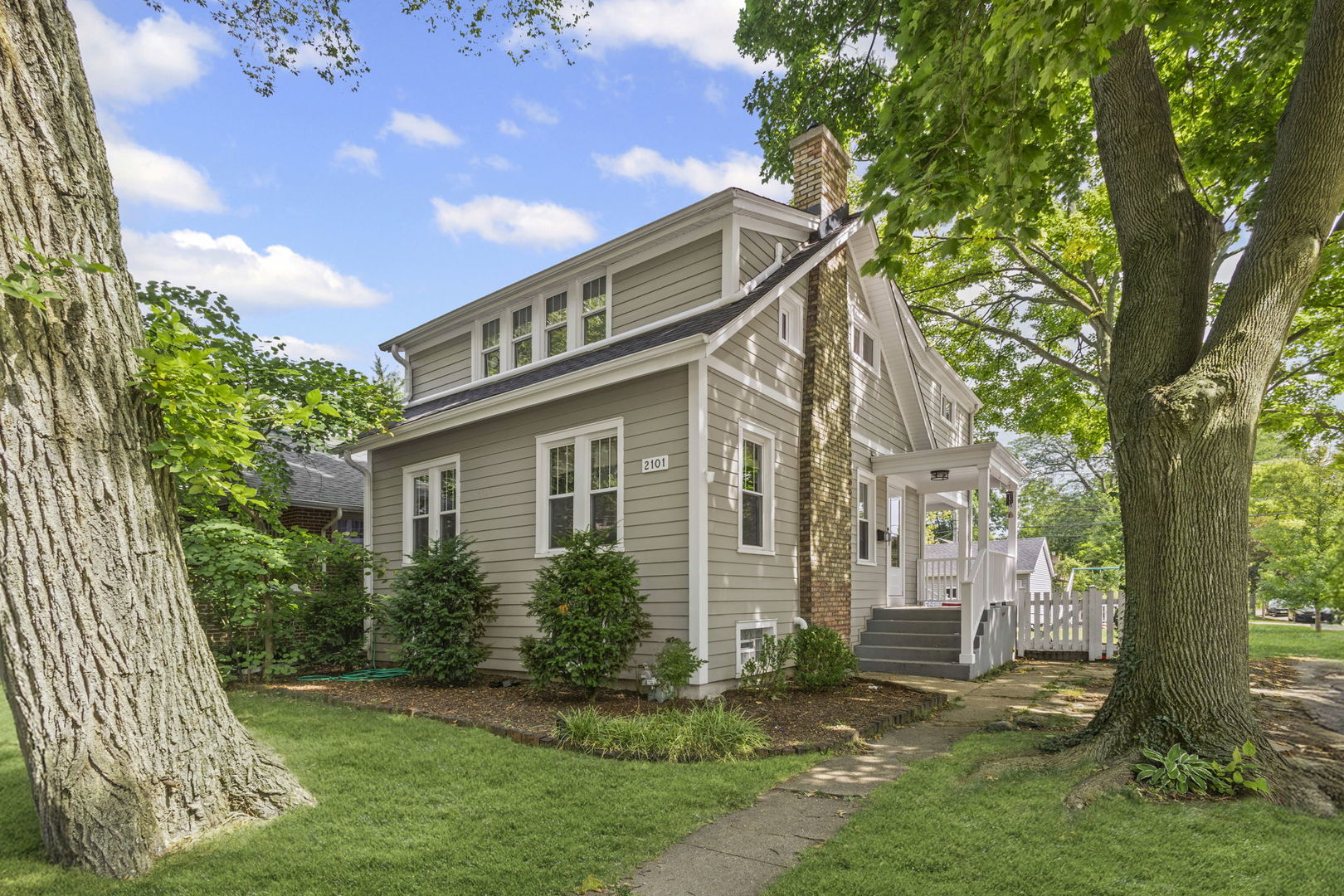 2101 Pioneer Road Evanston, IL 60201 - Photo 1 of 36 a view of a house with a yard