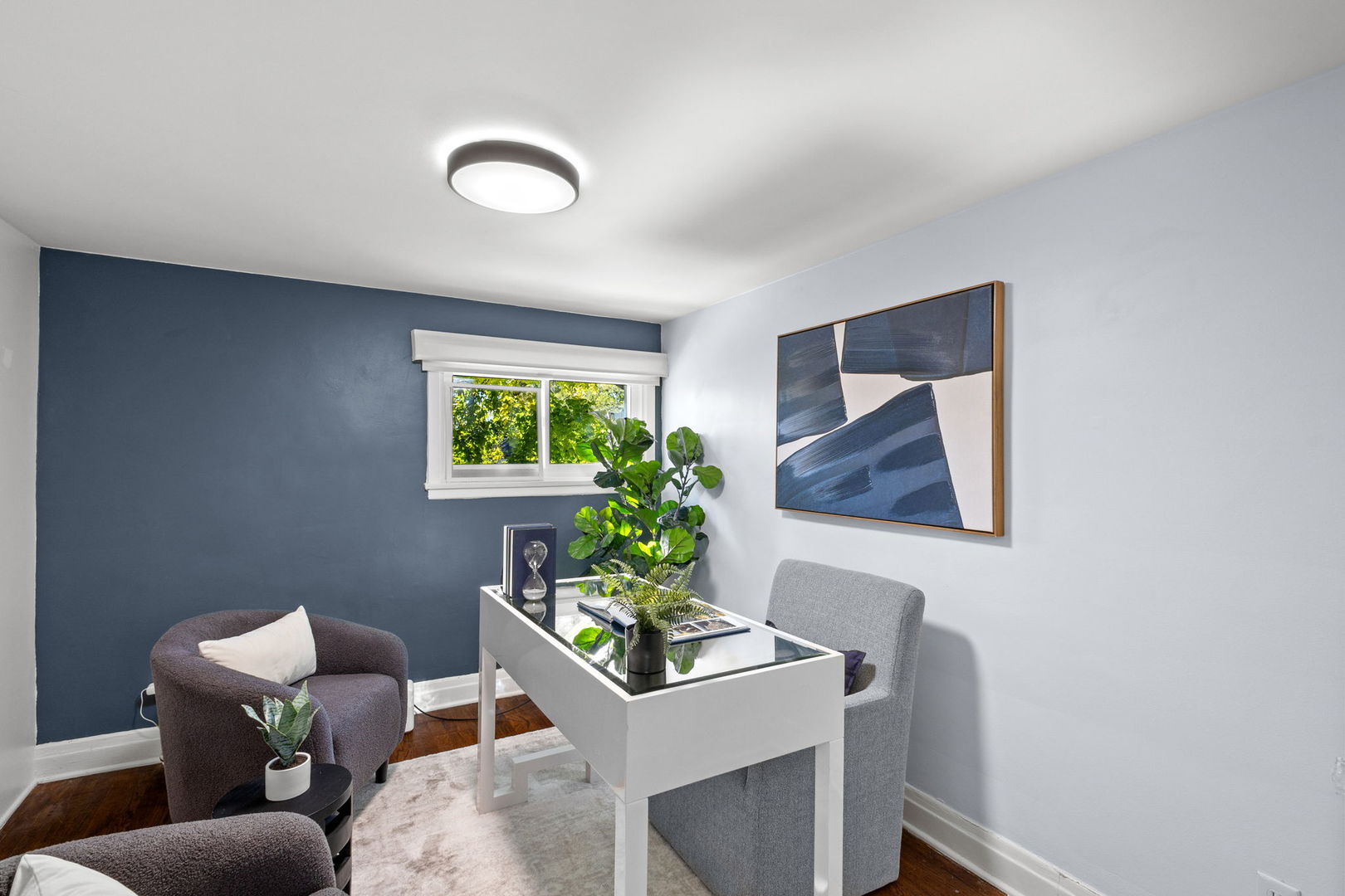 2101 Pioneer Road Evanston, IL 60201 - Photo 18 of 36 a living room with furniture and a potted plant