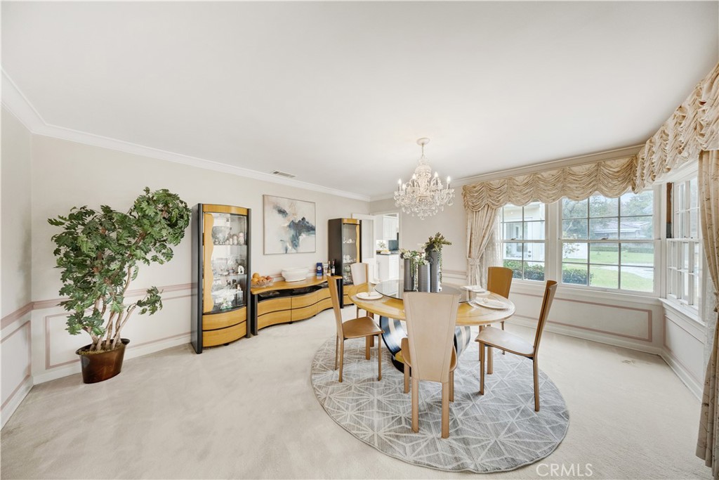 2835 Devonport Road San Marino, CA 91108 - Photo 13 of 54 a dining room with furniture and a floor to ceiling window