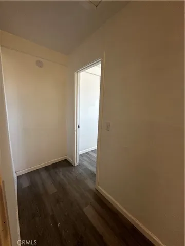 a view of small space with wooden floor