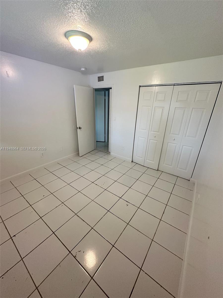 13993 Southwest 280th Terrace Homestead, FL 33033 - Photo 13 of 22 a view of a garage