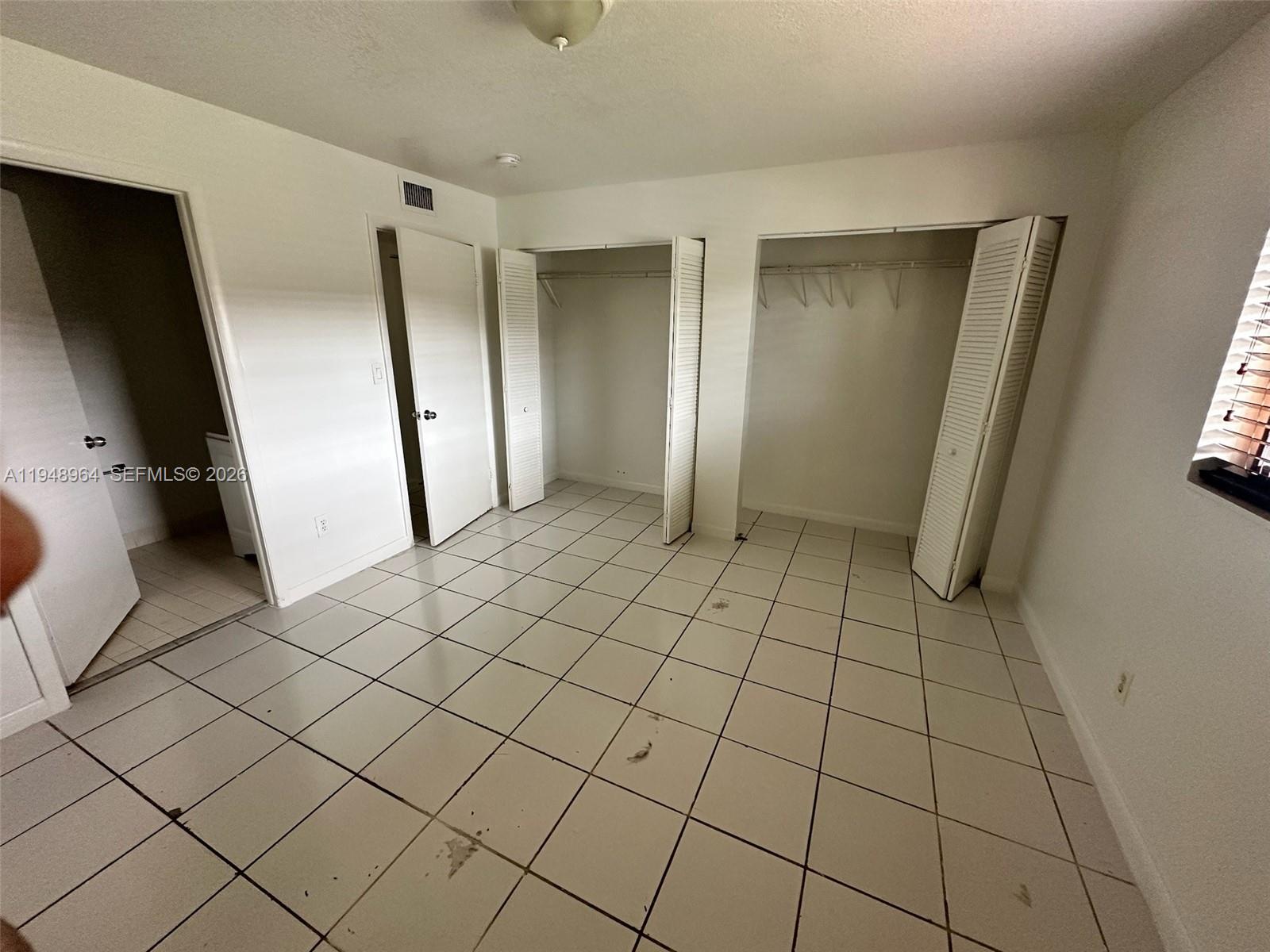 13993 Southwest 280th Terrace Homestead, FL 33033 - Photo 3 of 22 a view of an empty room
