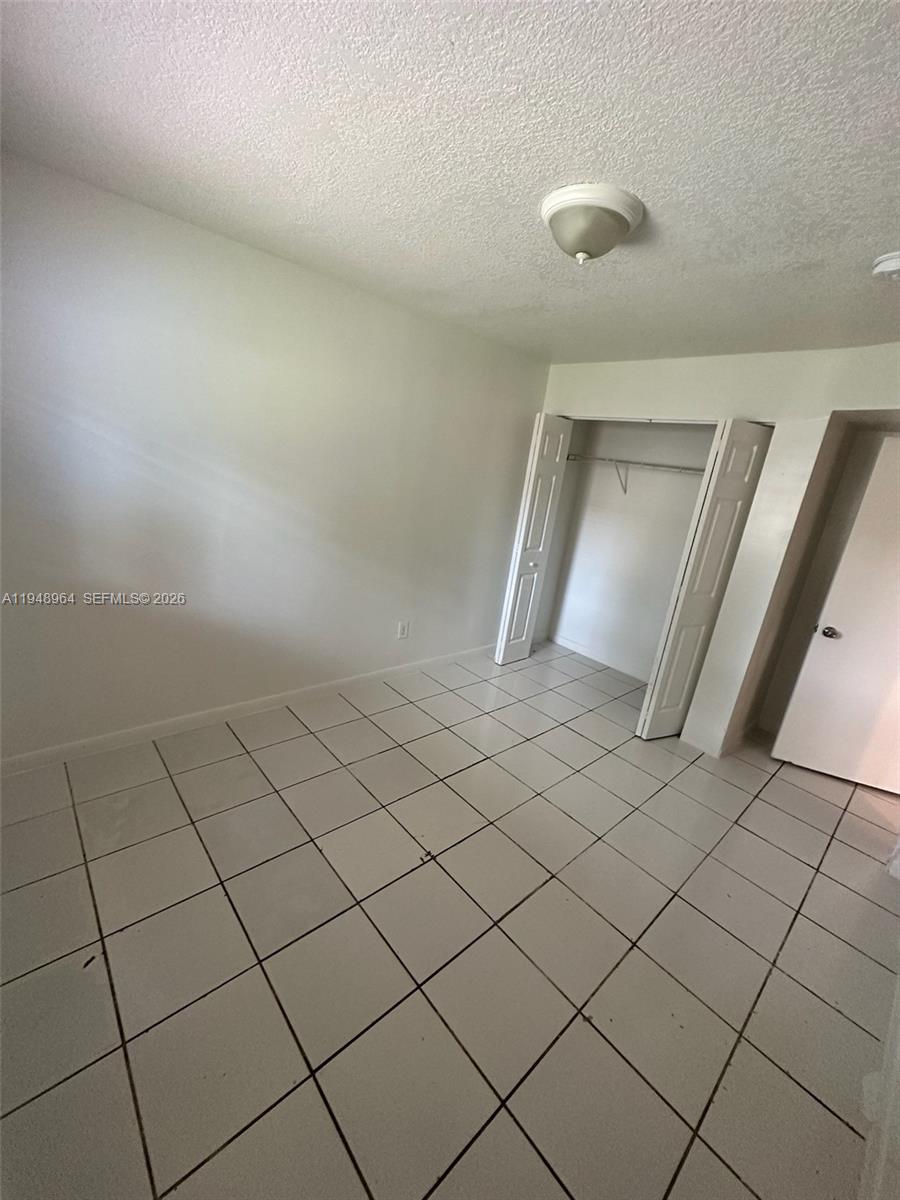 13993 Southwest 280th Terrace Homestead, FL 33033 - Photo 9 of 22 a view of a garage