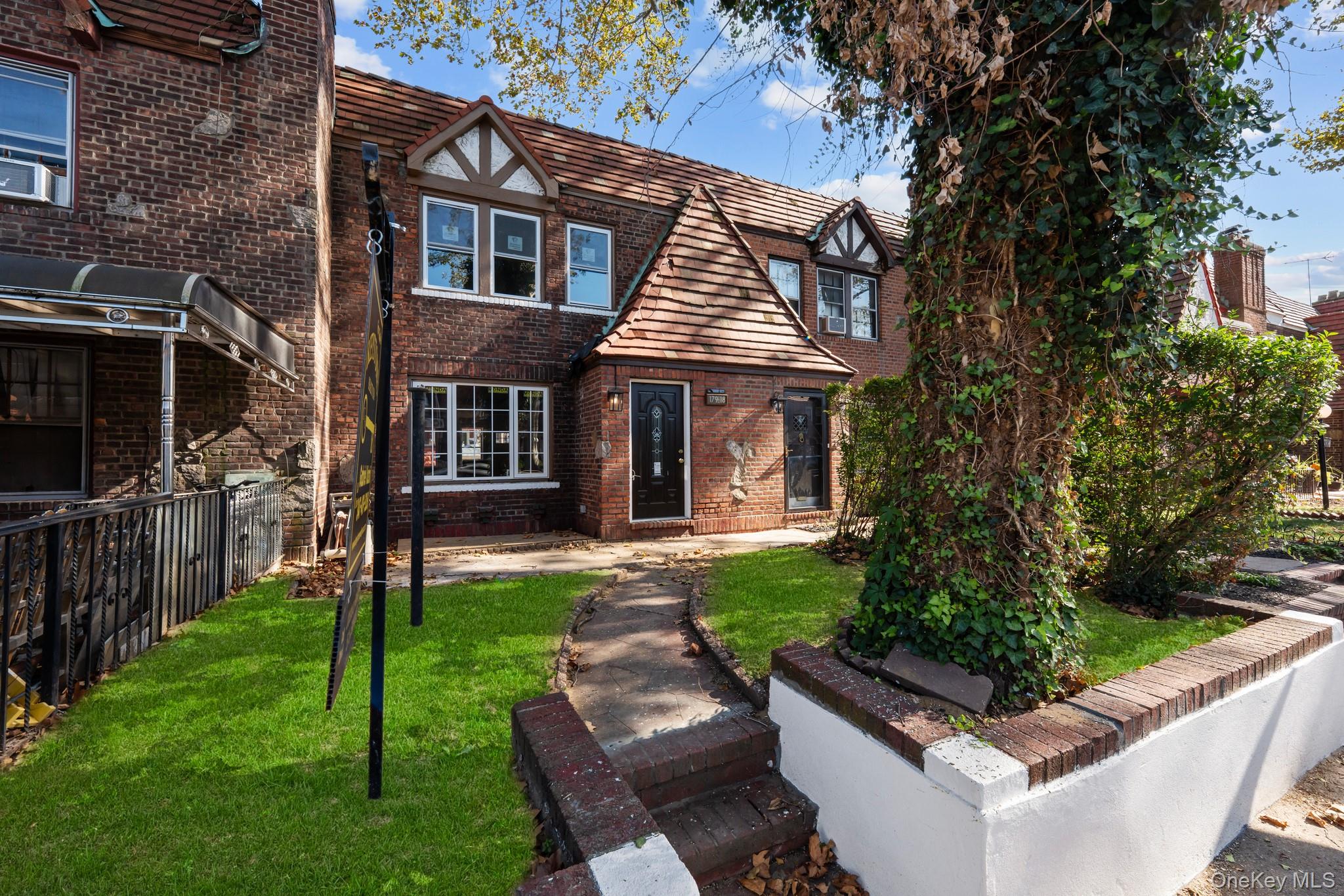 179-18 Selover Road Queens, NY 11434 - Photo 18 of 18 English style home featuring brick siding