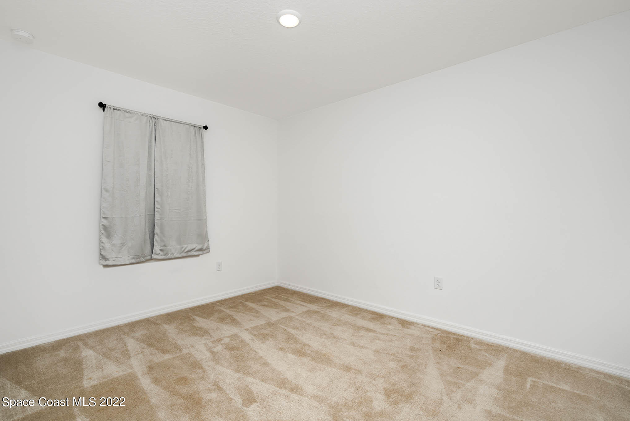 1061 Wabash Road Southeast Palm Bay, FL 32909 - Photo 14 of 22 a view of a small space with window