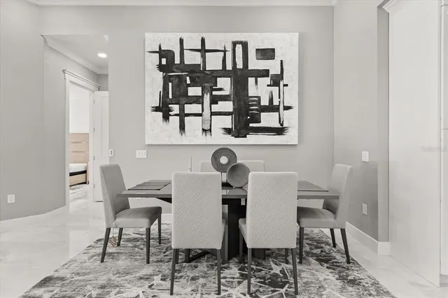 a large kitchen with stainless steel appliances a refrigerator and a stove top oven