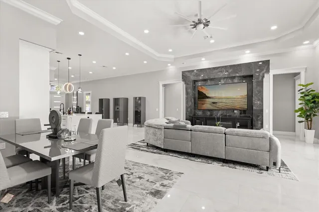 a kitchen with granite countertop a sink a stove a washer and dryer