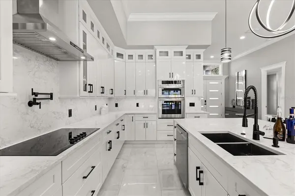 a view of walk in closet with white walls