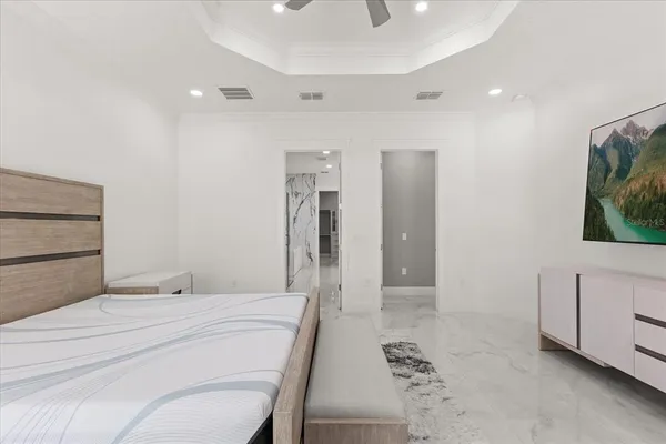 a bathroom with a double vanity sink a mirror and a shower