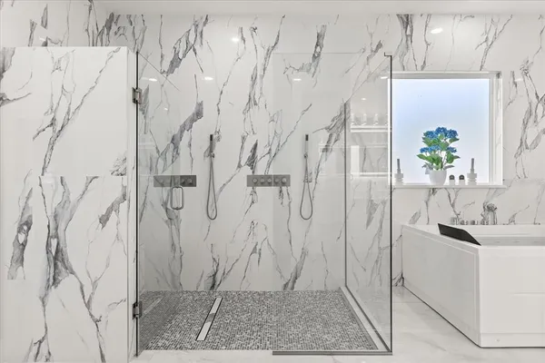 a picture of door with a shower