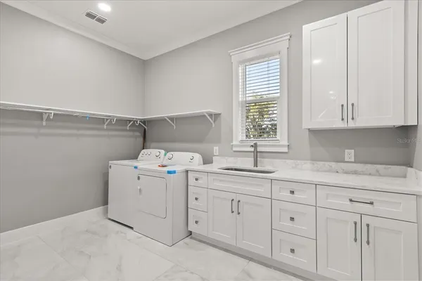 a view of a house with swimming pool and a yard