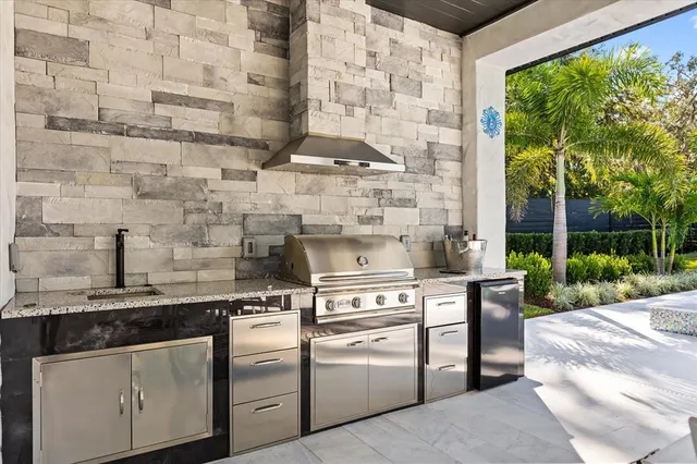 a view of a house with sitting area and garden view