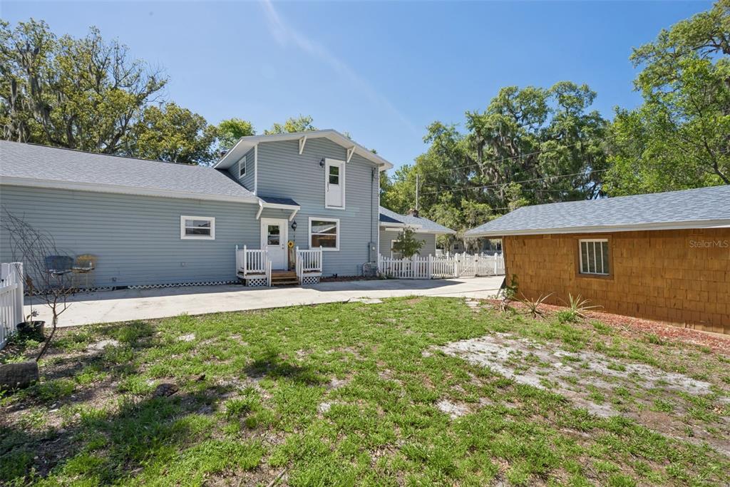 1048 North Grandview Street Mount Dora, FL 32757 - Photo 34 of 56 a house view with a garden space
