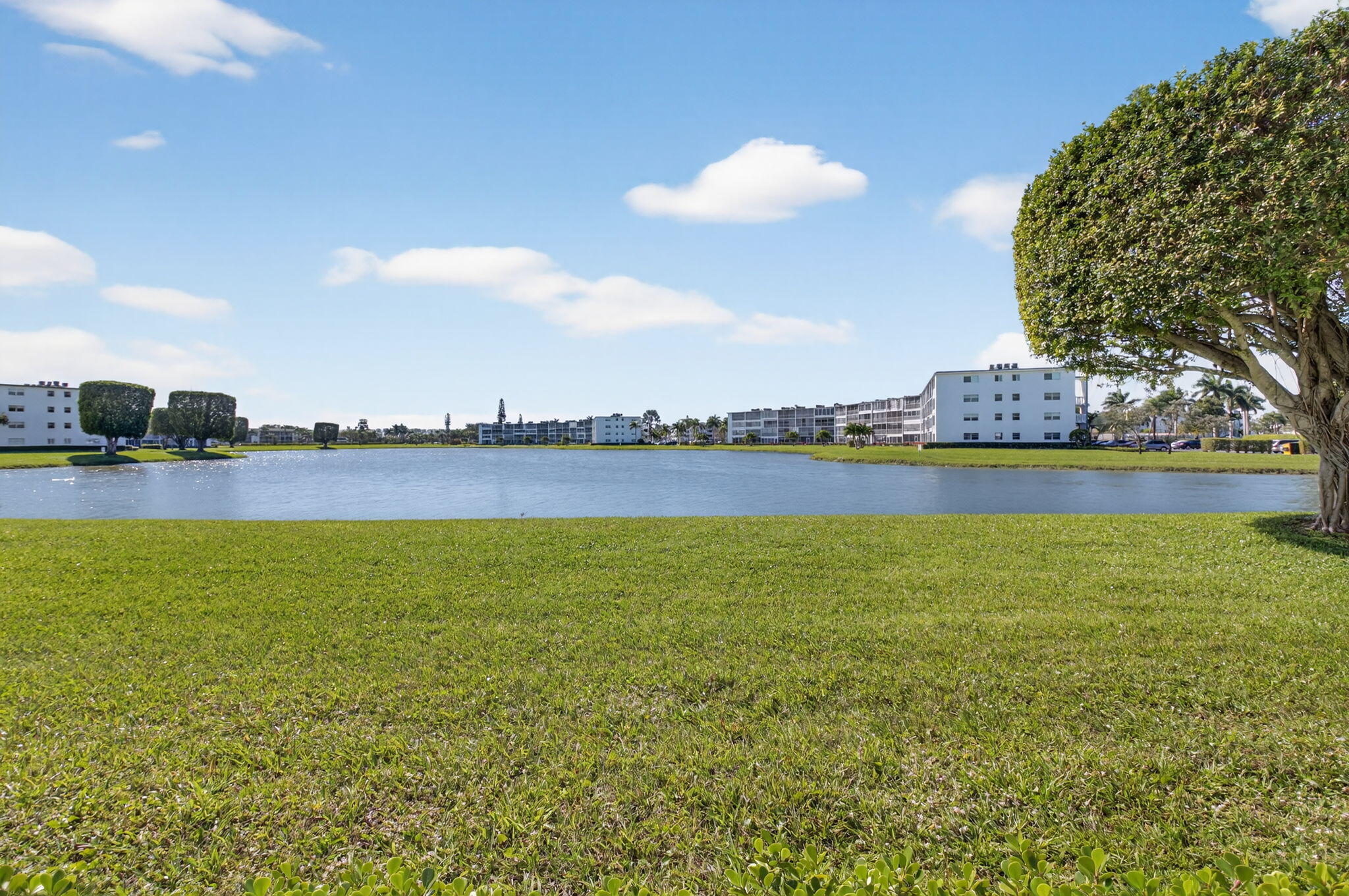 1056 Guildford East, Unit 1056 Boca Raton, FL 33434 - Photo 18 of 57 a view of an ocean and beach