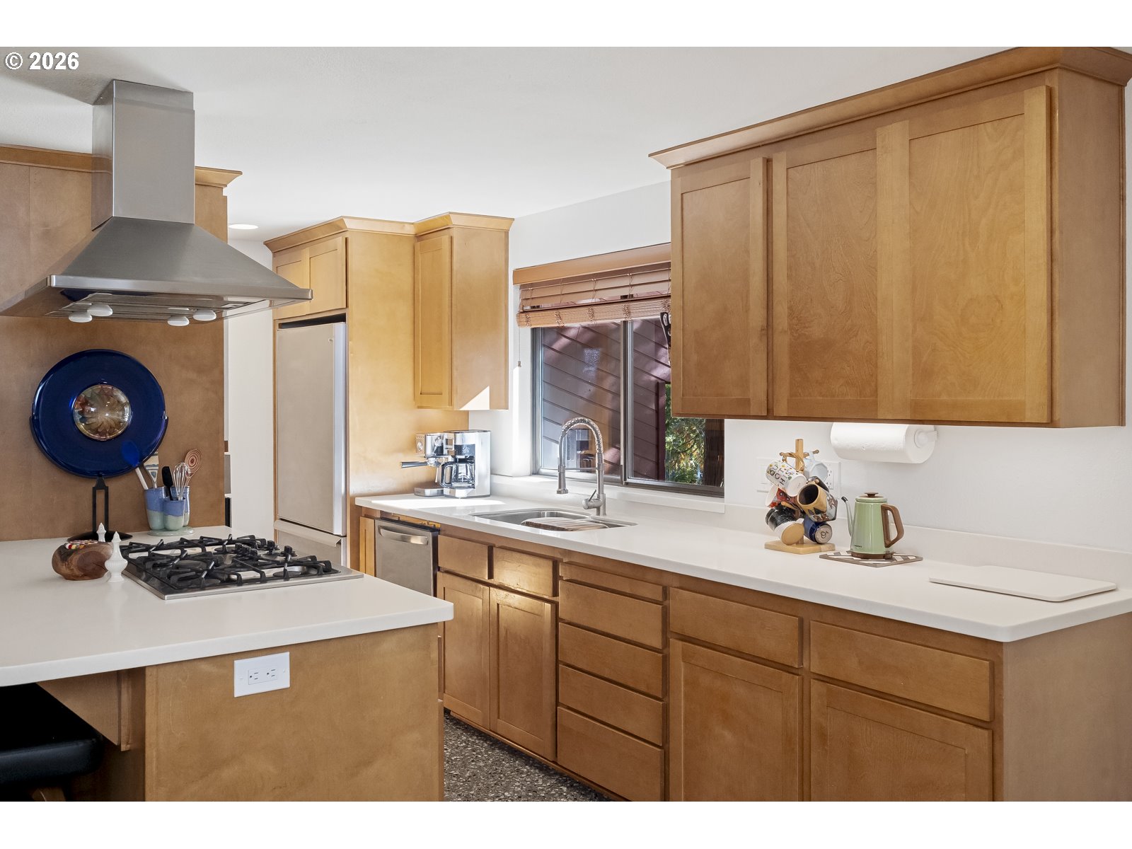 875 Southeast 25th Street Gresham, OR 97080 - Photo 20 of 48 a kitchen with a sink cabinets and appliances
