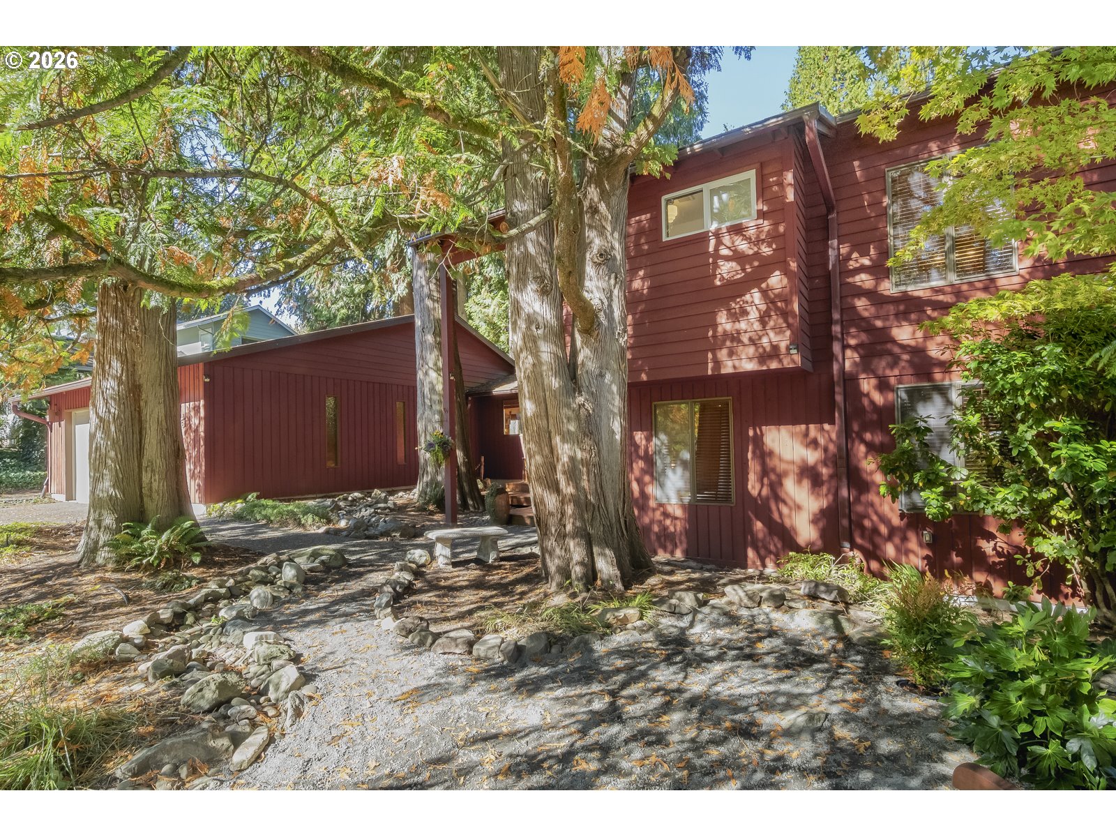 875 Southeast 25th Street Gresham, OR 97080 - Photo 2 of 48 a view of a brick building with many windows