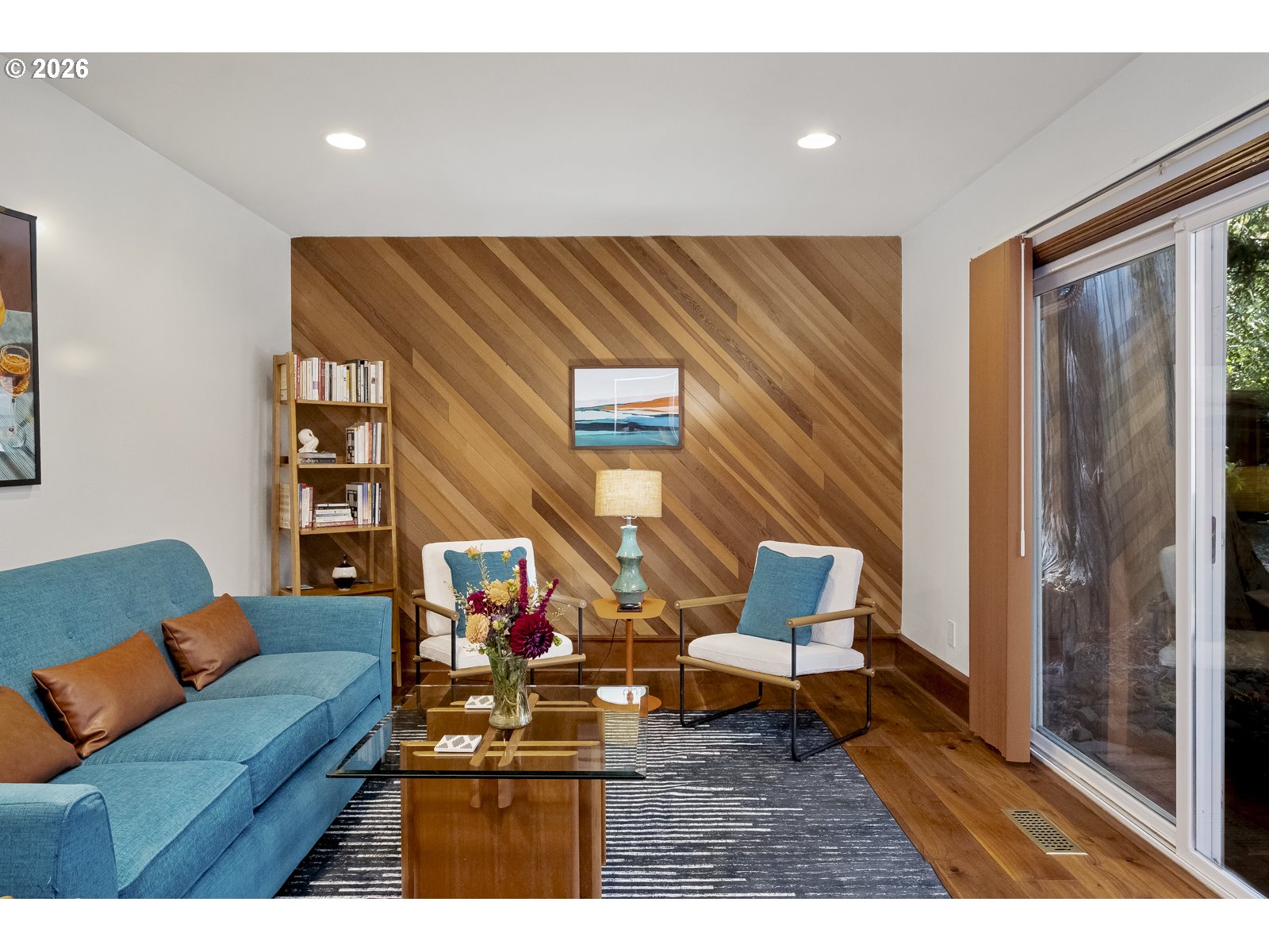 875 Southeast 25th Street Gresham, OR 97080 - Photo 21 of 48 a living room with furniture and wooden floor