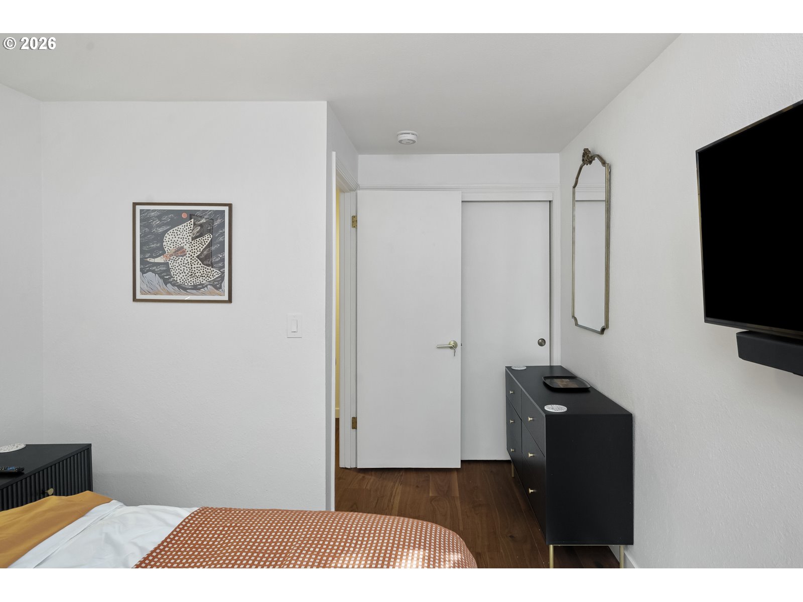 875 Southeast 25th Street Gresham, OR 97080 - Photo 25 of 48 a view of a bedroom with furniture and flat screen tv