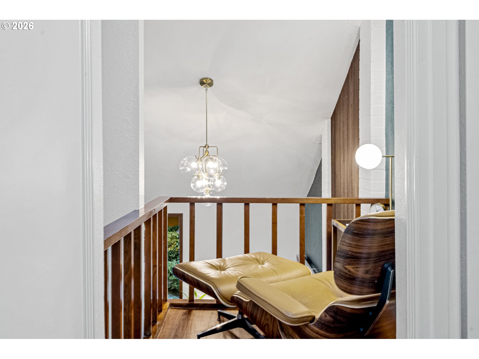 875 Southeast 25th Street Gresham, OR 97080 - Photo 30 of 48 a view of a balcony with furniture and chandelier