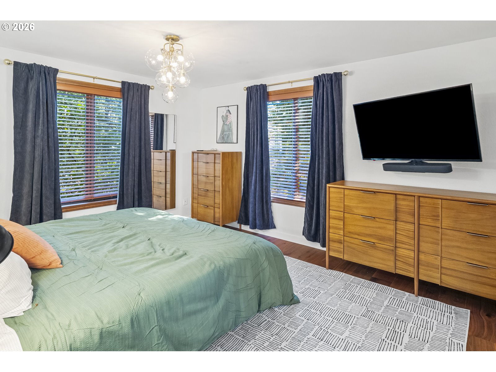 875 Southeast 25th Street Gresham, OR 97080 - Photo 32 of 48 a bedroom with a bed and a flat screen tv