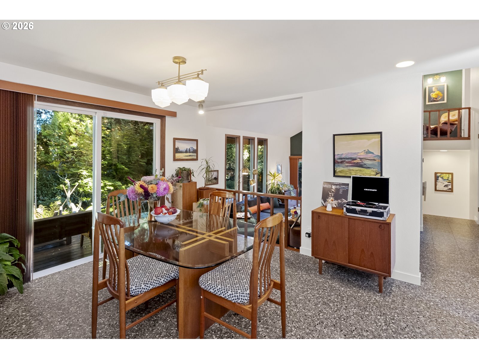 875 Southeast 25th Street Gresham, OR 97080 - Photo 9 of 48 a view of a dining room with furniture a chandelier and large windows