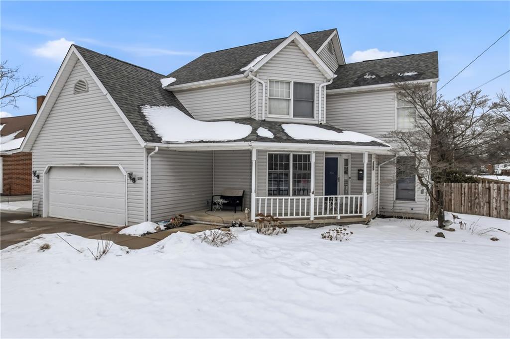 1359 Highland Road Sharon, PA 16146 - Photo 1 of 32 a front view of a house with a fence