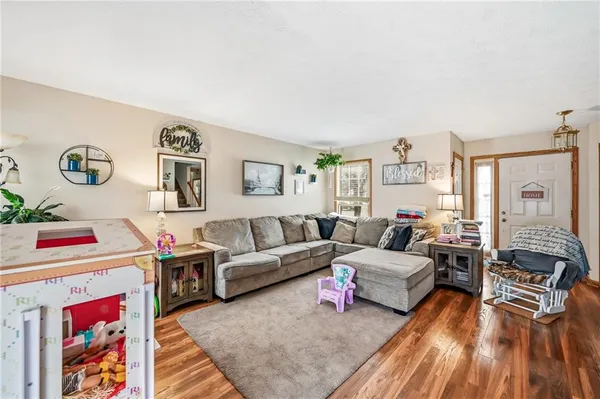 a living room with furniture and a couch
