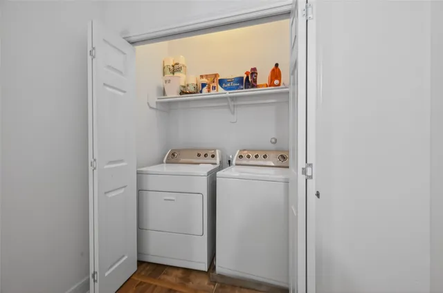a utility room with dryer and washer