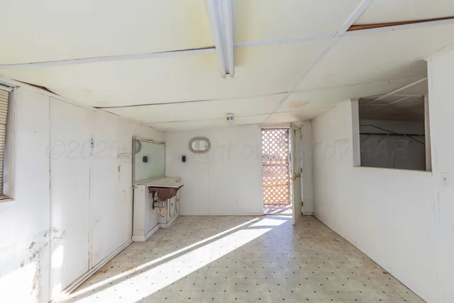 a bathroom with a sink toilet and tub