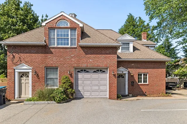front view of a house with a street
