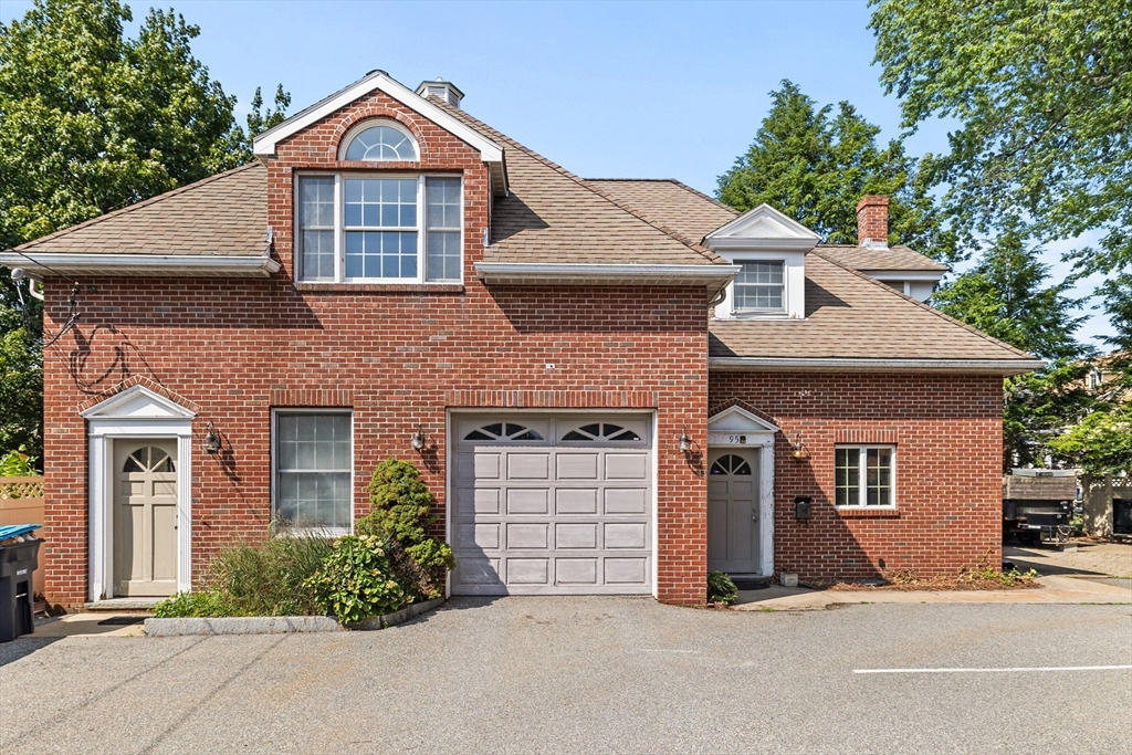 front view of a house with a street