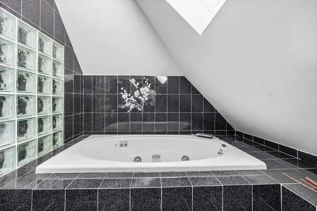 a bathroom with a bathtub