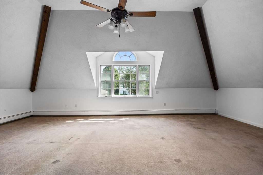 93 West R W Emerson, Unit 93R Melrose, MA 02176 - Photo 21 of 21 an empty room with windows