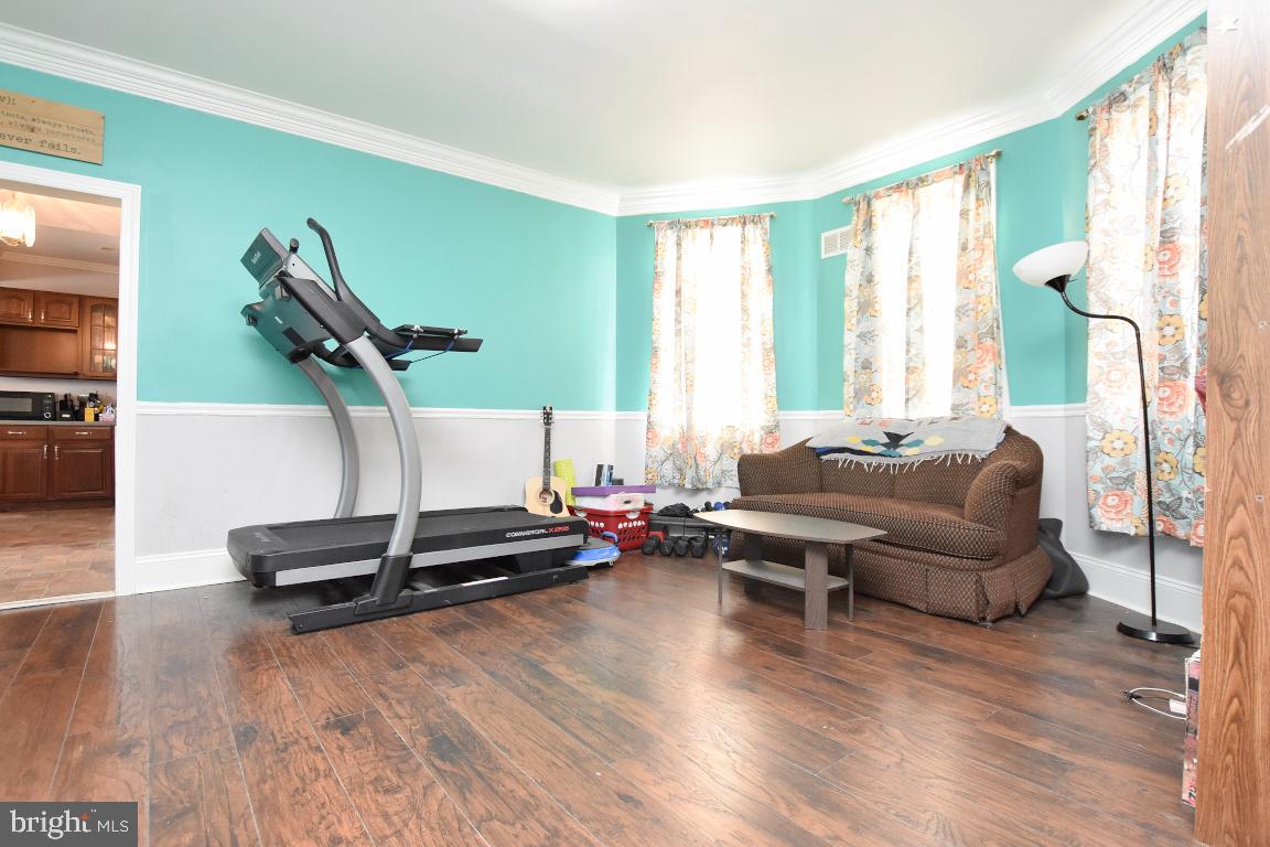 224 East Washington Street Riverside, NJ 08075 - Photo 5 of 30 Second living room through double pocket doors