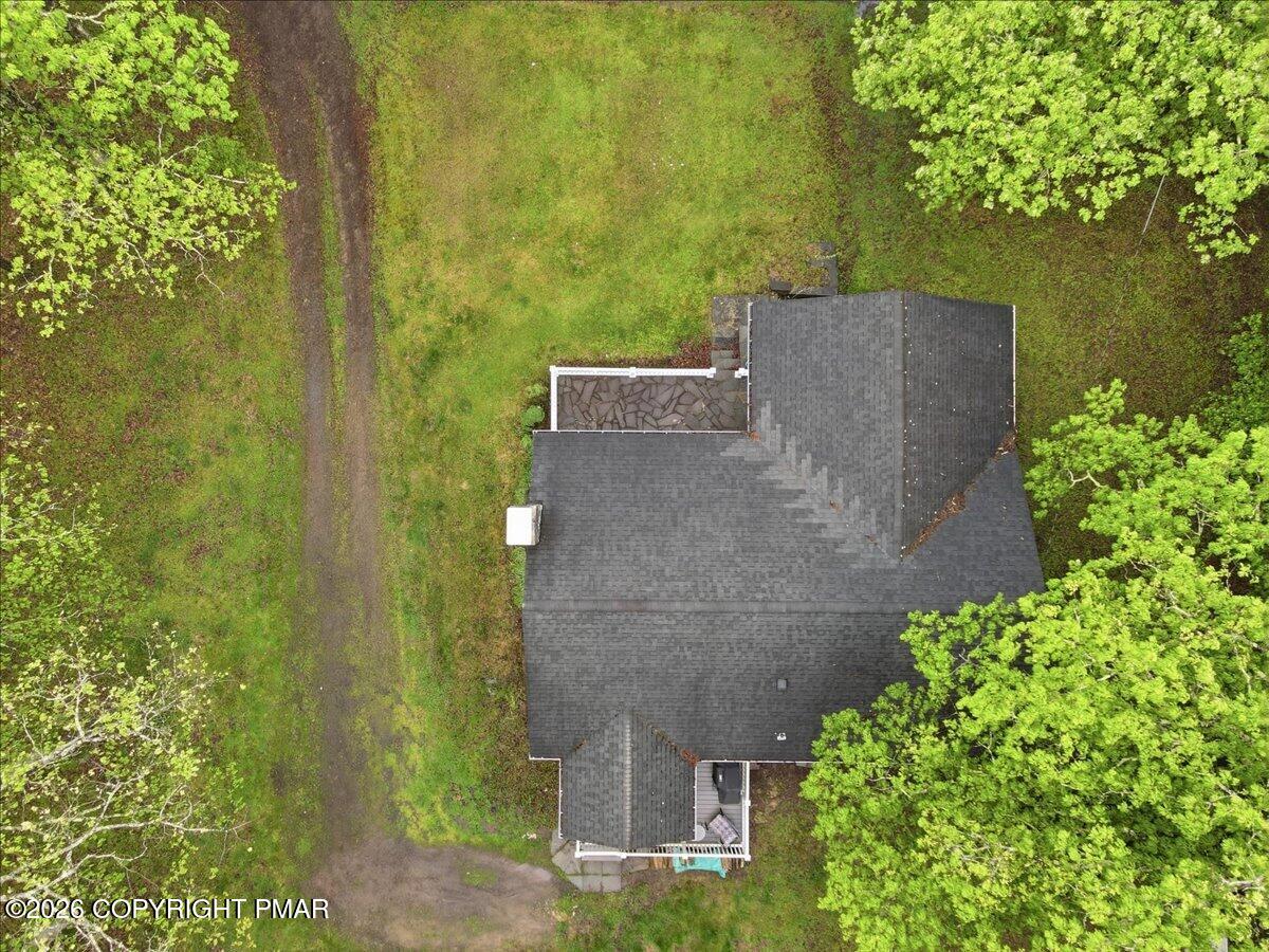 232 Garrity Road Hawley, PA 18428 - Photo 5 of 57 an aerial view of a house with a yard