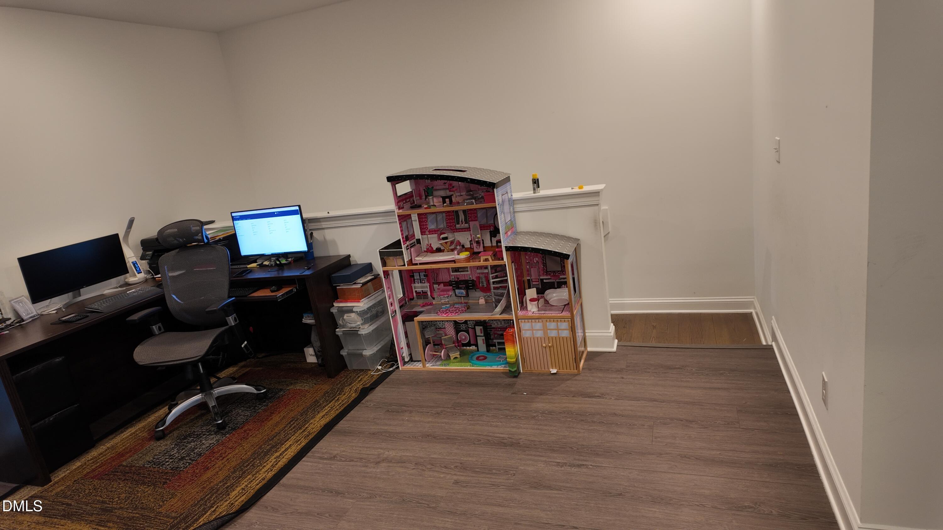 2143 Stegemann Street Apex, NC 27502 - Photo 17 of 39 a view of a workspace with furniture