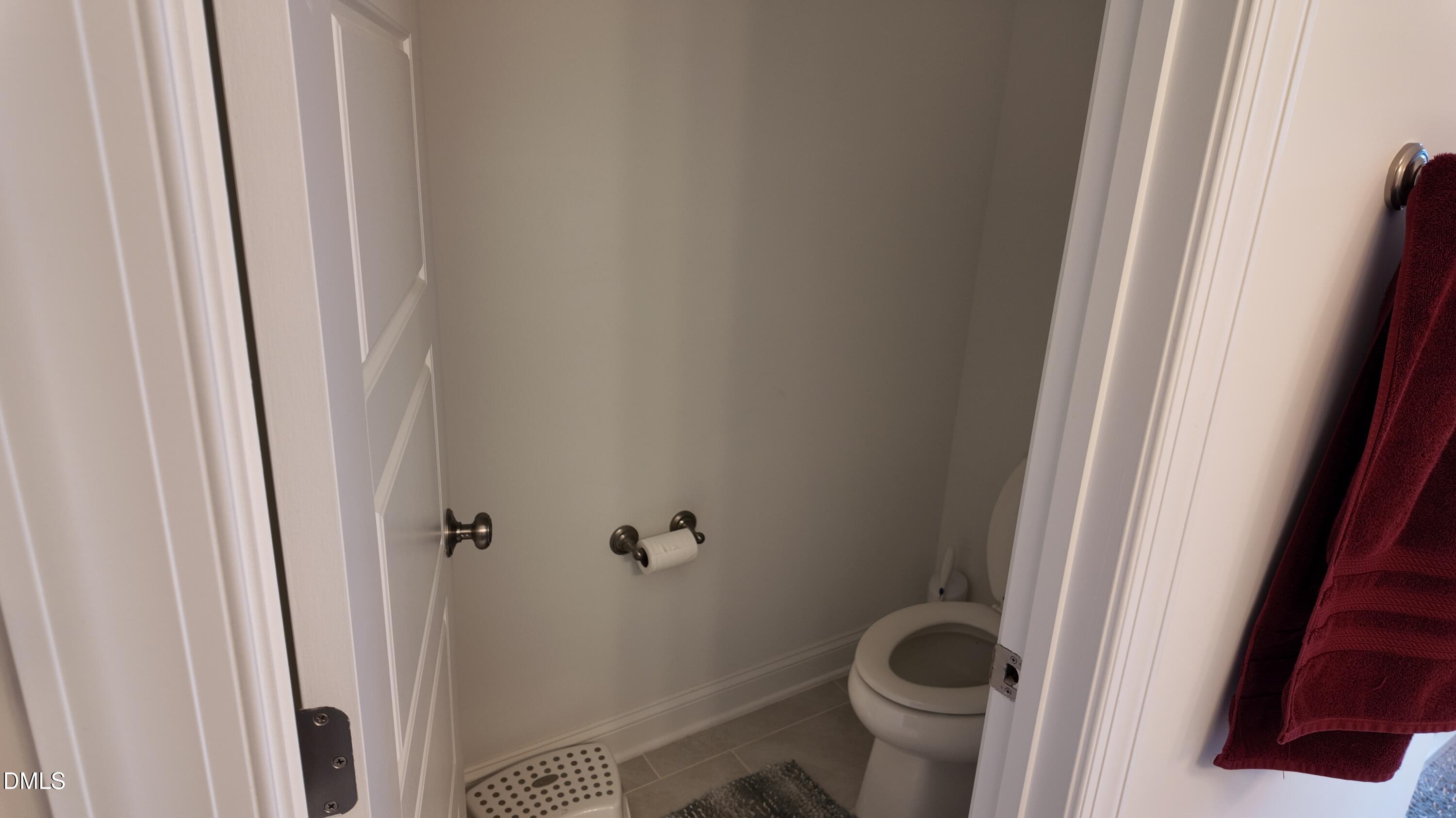 2143 Stegemann Street Apex, NC 27502 - Photo 24 of 39 a bathroom with a sink and toilet