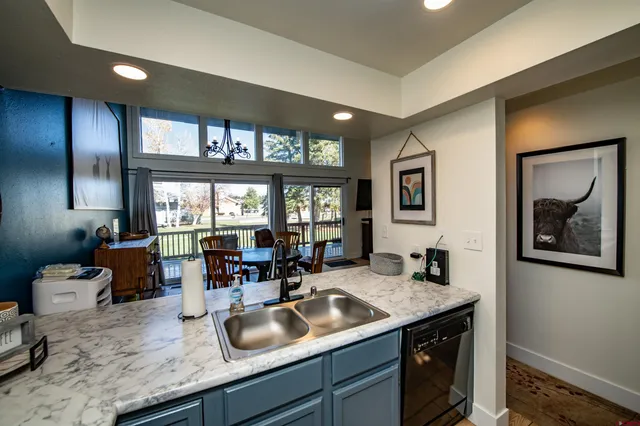 a kitchen with granite countertop lots of counter top space