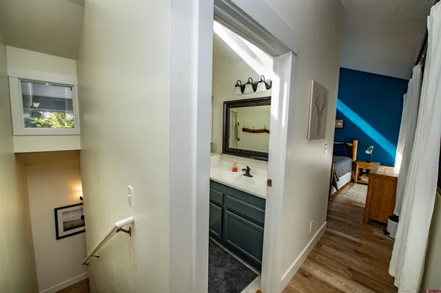 a room with cabinets and stairs