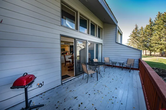 a backyard of a house with seating space