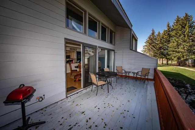 a backyard of a house with seating space