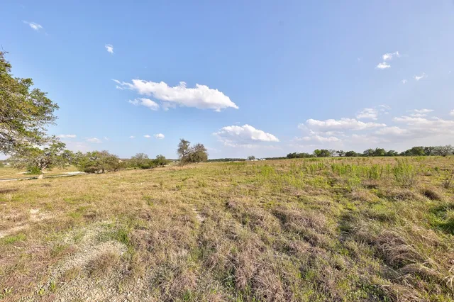 a view of an ocean and a mountain