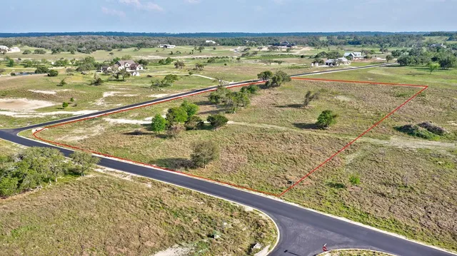 a view of a balcony with an ocean
